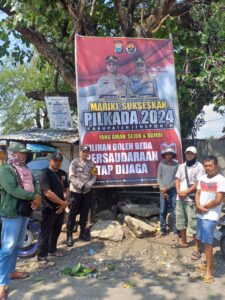 *Polres Jeneponto Sebar Baliho Tentang Himbauan Pilkada Damai Hingga Pelosok Desa*